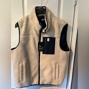 Bass outdoors blue and cream vest. Never warn new with tags.